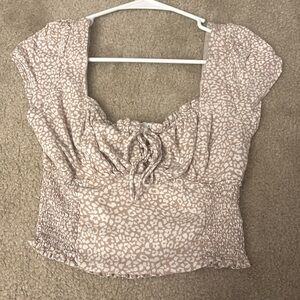 Urban romantic’s tan and white leopard print crop top size medium